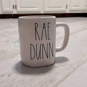 Rae Dunn mug with saying “Rae Dunn”